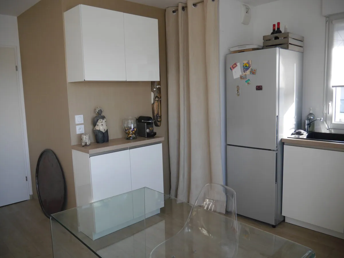 Salon d'un appartement T3 aménagé à Nantes Est, ambiance cocooning et raffinée